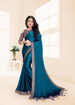 Flaunt Your Rich And Elegant Taste In This Designer Saree In Blue Color Paired With Blue Colored Blouse. This Silk Based Saree And Rich Color Pallete Will Earn You Lots Of Compliments From Onlookers.