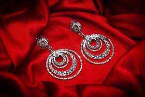 Grab This Pretty Earrings Set In Silver Color To Pair Up With Your Indo Western Attire. It Is Light In Weight And Can Be Paired With Any Colored Attire. Buy Now