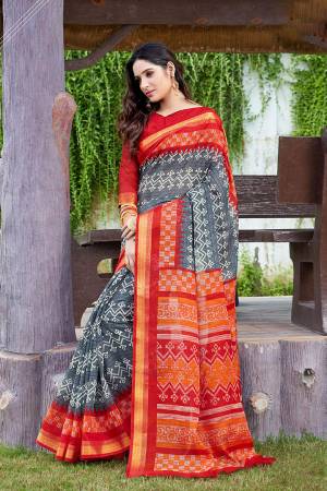Here Is A Pretty Saree For Your Semi-Casual Wear. This Beautiful?Printed Saree Is Fabricated On Super Net Paired With Cotton Fabricated Blouse. Its Attractive Broad Border Is Beautified With Multi Colored Thread Work.