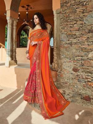 Here Is A Proper Traditional Looking Heavy Designer Saree In Orange And Pink Color Paired With Golden Colored Blouse. This Saree Is Fabricated on Slub Silk And Georgette Paired With Art Silk Fabricated Blouse. This Saree Is Durable And Easy To Care For. 