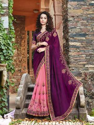 For A Royal And Elegant Look, Here Is The Perfect Heavy Designer Saree For The Same In Purple And Pink Color. This Beautiful Heavy Embroidered Saree Is Fabricated on Satin Silk And Chiffon Paired With Art Silk Fabricated Blouse. Buy Now.
