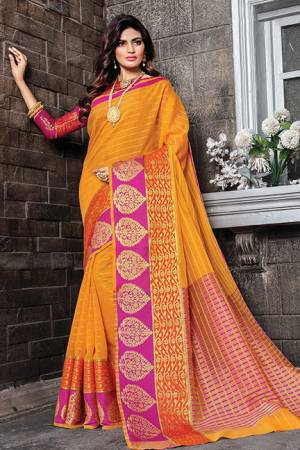 Celebrate This Festive Season Wearing This Saree In Musturd Yellow Color Paired With Contrasting Rani Pink Colored Blouse. This Saree And Blouse Are Cotton Silk Beautified With Weave and Prints. Buy Now.