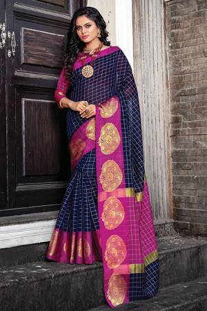 Add This Pretty Designer Saree To Your Wardrobe In Navy Blue Color Paired With Contrasting Magenta Pink Colored Blouse. This Saree And Blouse Are Fabricated On Cotton Silk Beautified With Prints And Weave. Buy Now.