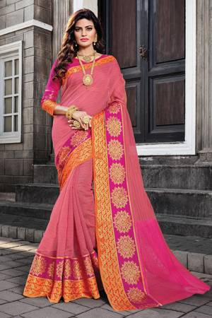 Add This Pretty Designer Saree To Your Wardrobe In Pink Color Paired With  Rani Pink Colored Blouse. This Saree And Blouse Are Fabricated On Cotton Silk Beautified With Prints And Weave. Buy Now.