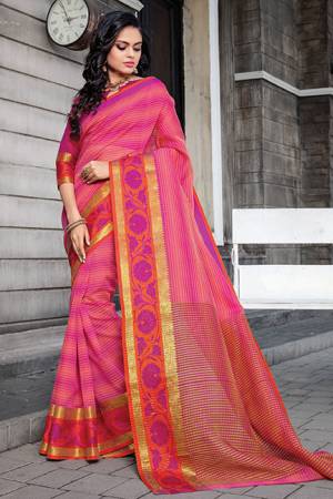 Add This Pretty Designer Saree To Your Wardrobe In Pink Color Paired With Contrasting Dark Pink Colored Blouse. This Saree And Blouse Are Fabricated On Cotton Silk Beautified With Prints And Weave. Buy Now.