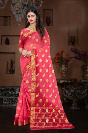 Here Is A Pretty Shaded Saree In Pink And Red Color. This Saree Is Fabricated On Chiffon Paired With Art Silk Fabricated Blouse. It Is Beautified With Attractive Weave All Over. 