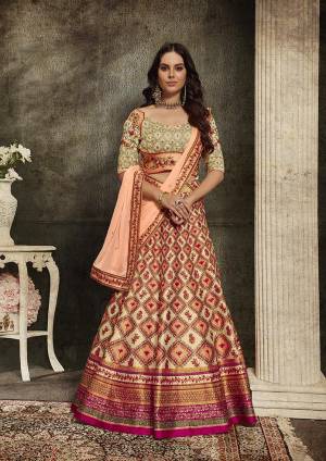Grab This Beautiful Designer Two In One Lehenga Choli Cum Gown In?Beige And Orange Color. You Can Get This Stitched As A Lehenga Or Floor Length Gown As Per Your Occasion And Convenience. Its Blouse Are Lehenga Are Fabricated On Soft Silk Beautified With Digital Prints And Embroidery Paired With Chiffon Fabricated Dupatta. Buy This Heavy Designer Piece Now