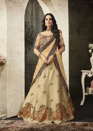 Grab This Beautiful Designer Two In One Lehenga Choli Cum Gown In?Cream And Beige Color. You Can Get This Stitched As A Lehenga Or Floor Length Gown As Per Your Occasion And Convenience. Its Blouse Are Lehenga Are Fabricated On Soft Silk Beautified With Digital Prints And Embroidery Paired With Chiffon Fabricated Dupatta. Buy This Heavy Designer Piece Now