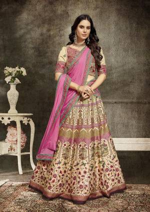 Grab This Beautiful Designer Two In One Lehenga Choli Cum Gown In?Cream And Pink Color. You Can Get This Stitched As A Lehenga Or Floor Length Gown As Per Your Occasion And Convenience. Its Blouse Are Lehenga Are Fabricated On Soft Silk Beautified With Digital Prints And Embroidery Paired With Chiffon Fabricated Dupatta. Buy This Heavy Designer Piece Now