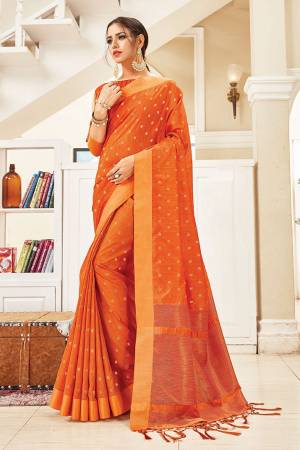Enhance Your Personality Wearing This Elegant And Rich Looking Saree In Orange Color. This Saree And Blouse Are Fabricated On Art Silk Which Gives A Rich Look To Your Personality. 