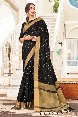Enhance Your Personality Wearing This Elegant And Rich Looking Saree In Black Color. This Saree And Blouse Are Fabricated On Art Silk Which Gives A Rich Look To Your Personality. 