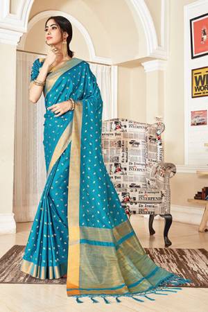 Celebrate This Festive Season With Beauty And Comfort In This Silk Based Saree In Blue Color. This Saree Is Light In Weight And Easy To Carry All Day Long, Also Its Rich Fabric And Color Will Earn you Lots Of Compliments From Onlookers.