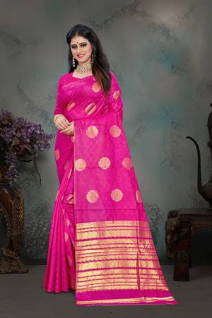 Shine Bright Wearing This Designer Saree In Rani Pink Color Paired With Rani Pink Colored Blouse. This Saree And Blouse Are Fabricated Art Silk Beautified With Weave All Over. Buy Now.