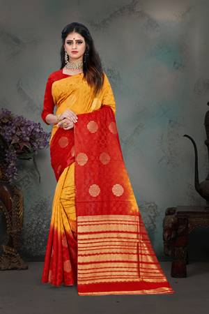 Shine Bright Wearing This Designer Saree In Musturd Yellow And Red Color Paired With Red Colored Blouse. This Saree And Blouse Are Fabricated Art Silk Beautified With Weave All Over. Buy Now.