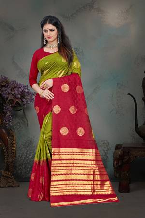 Shine Bright Wearing This Designer Saree In Green And Red Color Paired With Red Colored Blouse. This Saree And Blouse Are Fabricated Art Silk Beautified With Weave All Over. Buy Now.
