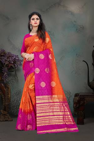 Shine Bright Wearing This Designer Saree In Orange And Rani Pink Color Paired With Rani Pink Colored Blouse. This Saree And Blouse Are Fabricated Art Silk Beautified With Weave All Over. Buy Now.
