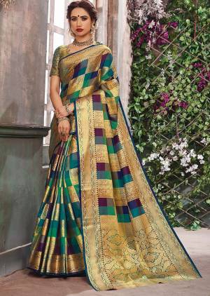 Go Colorful With This Designer Silk Based Saree In Multi Color. This Saree And Blouse Are Fabricated On Banarasi Art Silk Beautified With Multi Colored Checks And Heavy Weave All Over. Buy Now