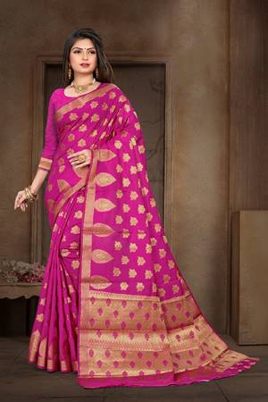 Enhance Your Personality Wearing This Designer Silk Based Saree In Rani Pink Color Paired With Rani Pink Colored Blouse. This Saree And Blouse Are Art Silk Based Beautified With Weave All Over
