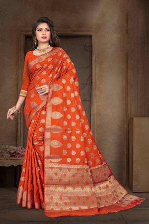 Celebrate This Festive Season Wearing This Saree In Orange Color?Paired With Orange Colored Blouse. This Saree And Blouse Are Art Silk Based Beautified With Weave