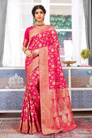 Shine Bright Wearing This Designer Saree In Fuschia Pink Color Paired With Fuschia Pink Colored Blouse. This Saree And Blouse Are Fabricated On Weaving Art Silk Beautified With Weave All Over. Buy Now.