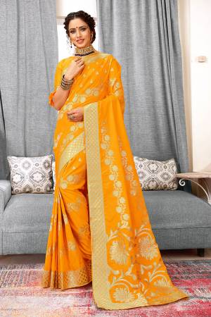 Celebrate This Festive Season Wearing This Designer Silk Based Saree In Musturd Yellow Color. This Saree And Blouse Are Fabricated Weaving Art Silk Beautified With Attractive Detailed Weave All Over. 