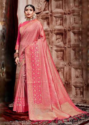 Look Beautiful In This Very Pretty Pink Colored Designer Saree. This Saree And Blouse Are Silk Based Beautified With Weave All Over. Its Rich Fabric And Color Will Earn You Lots Of Compliments From Onlookers. 