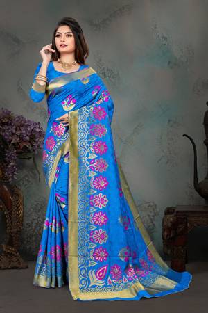 Grab This Pretty Foil Printed Designer Saree In Blue Color Paired With Blue Colored Blouse, This Saree And Blouse Are Fabricated On Nylon Art Silk. Its Rich Fabric And Attractive Weave Will Earn You Lots Of Compliments From Onlookers. 