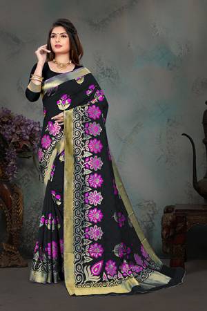 Grab This Pretty Foil Printed Designer Saree In Black Color Paired With Blue Colored Blouse, This Saree And Blouse Are Fabricated On Nylon Art Silk. Its Rich Fabric And Attractive Weave Will Earn You Lots Of Compliments From Onlookers. 