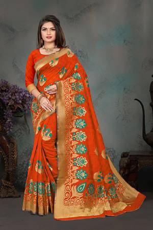 Grab This Pretty Foil Printed Designer Saree In Orange Color Paired With Blue Colored Blouse, This Saree And Blouse Are Fabricated On Nylon Art Silk. Its Rich Fabric And Attractive Weave Will Earn You Lots Of Compliments From Onlookers. 