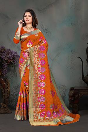 Grab This Pretty Foil Printed Designer Saree In Rust Orange Color Paired With Blue Colored Blouse, This Saree And Blouse Are Fabricated On Nylon Art Silk. Its Rich Fabric And Attractive Weave Will Earn You Lots Of Compliments From Onlookers. 