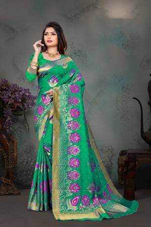 Grab This Pretty Foil Printed Designer Saree In Blue Color Paired With Green Colored Blouse, This Saree And Blouse Are Fabricated On Nylon Art Silk. Its Rich Fabric And Attractive Weave Will Earn You Lots Of Compliments From Onlookers. 
