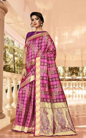 Here Is A Beautiful Designer Silk Based Saree In Dark Pink And Purple Color. This Pretty Checks Patterned Saree Is Fabricated On Jacquard Silk Paired With Art Silk Fabricated Blouse. Buy This Saree Now.