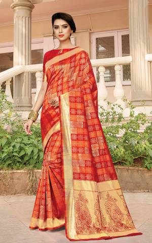 For A Proper Traditional Look With Traditional Color Pallete, Grab This Designer Saree In Orange And Red Color Paired With Red Colored Blouse. This Saree Is Fabricated On Jacquard Silk Beautified With Checks Pattern Paired With art Silk Fabricated Blouse. 
