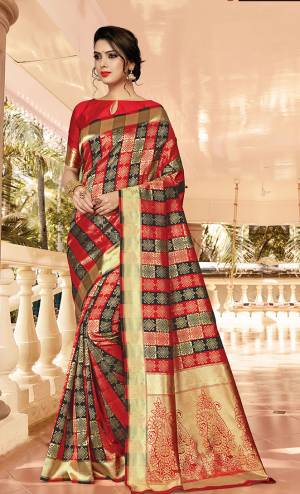 Here Is A Beautiful Designer Silk Based Saree In Red And Black Color. This Pretty Checks Patterned Saree Is Fabricated On Jacquard Silk Paired With Art Silk Fabricated Blouse. Buy This Saree Now.