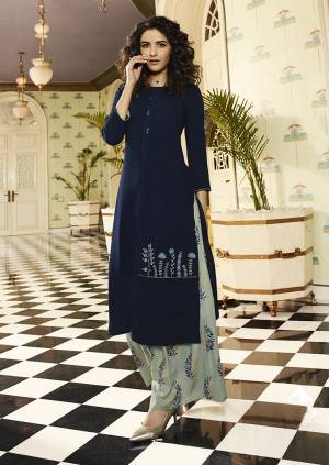 Enhance Your Personality Wearing This Elegant Readymade Kurti In Navy Blue Color Paired With Contrasting Grey Colored Plazzo. This Readymade Kurti And Plazzo Are Fabricated On Rayon Beautified With Prints And Resham Work. Buy Now.