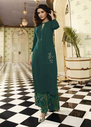 You Will Definitely Earn Lots Of Compliments Wearing This Designer Readymade Pair Of Kurti And Plazzo In Teal Green Color. This Pretty Pair Is Fabricated On Rayon Which IS Light Weight And Durable And Also It Is Available In All Regular Sizes. 