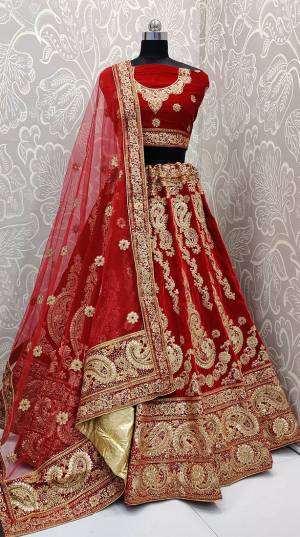 Here Is Trending Very Beautiful Heavy Designer Lehenga Choli In All Over Maroon Color. Its Blouse And Lehenga Are Fabricated On Rich Velvet Beautified With Heavy Embroidery Paired With Net Fabricated Heavy Embroidered Dupatta. Buy This Pretty Piece Now
