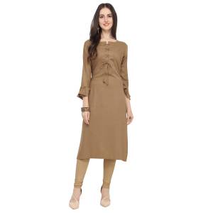 Look Pretty In This Designer Readymade Straight Kurti In Beige Color. This Kurti Is Fabricated On Rayon Which Is Soft Towards Skin And And Easy To Carry All Day Long. 