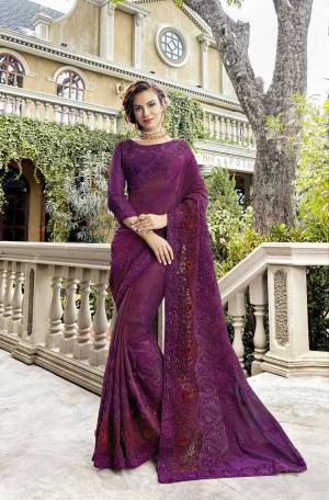 Here Is A Pretty Purple Colored Heavy Designer Saree Suitable For The Upcoming Wedding And Festive Season. This Saree Is Fabricated On Silk Georgette Paired With art Silk Fabricated Blouse. Buy Now. 