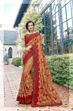 Evergreen Combination Is Here With This Heavy Designer Saree In Beige And Red Color. This Saree Silk Georgette Based Beautified With Heavy Embroidery Paired With Art Silk Fabricated Embroidered Blouse. 