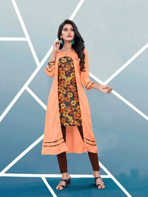 Add This Pretty Readymade Kurti In Orange And Multi Color Fabricated On Satin Beautified With Prints. It Is Light In Weight And Easy To Wear All Day Long. Buy Now.