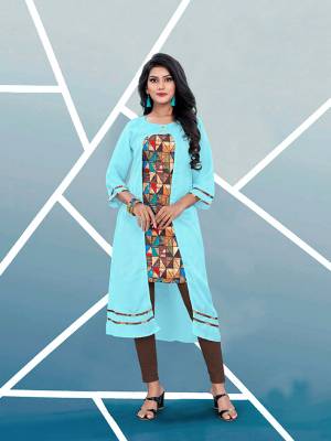 Add This Pretty Readymade Kurti In Blue And Multi Color Fabricated On Satin Beautified With Prints. It Is Light In Weight And Easy To Wear All Day Long. Buy Now.