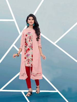 Add This Pretty Readymade Kurti In Pink And Multi Color Fabricated On Satin Beautified With Prints. It Is Light In Weight And Easy To Wear All Day Long. Buy Now.