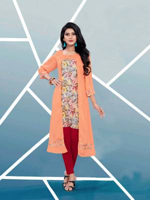 Add This Pretty Readymade Kurti In Orange And Multi Color Fabricated On Satin Beautified With Prints. It Is Light In Weight And Easy To Wear All Day Long. Buy Now.