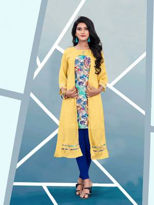 Add This Pretty Readymade Kurti In Yellow And Multi Color Fabricated On Satin Beautified With Prints. It Is Light In Weight And Easy To Wear All Day Long. Buy Now.