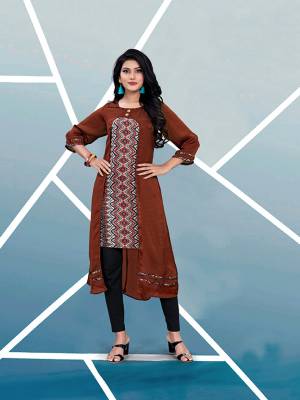 Add This Pretty Readymade Kurti In Maroon And Multi Color Fabricated On Satin Beautified With Prints. It Is Light In Weight And Easy To Wear All Day Long. Buy Now.