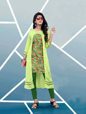 Add This Pretty Readymade Kurti In Light Green And Multi Color Fabricated On Satin Beautified With Prints. It Is Light In Weight And Easy To Wear All Day Long. Buy Now.