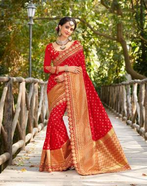 Adorn The Pretty Angelic Look In This Very Beautiful Heavy Designer Saree In Red. This Saree Is Fabricated On Jacquard Silk Paired With art Silk Fabricated Blouse. 