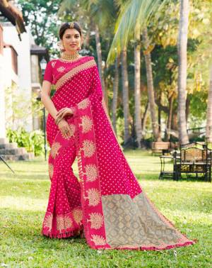 Bright And Visually Appealing Color Is Here With This Heavy Designer Saree In Rani Pink Color Paired With Rani Pink Colored Blouse. This Attractive Looking Saree Is Fabricated On Jacquard Silk Paired With Art Silk Fabricated Blouse. 