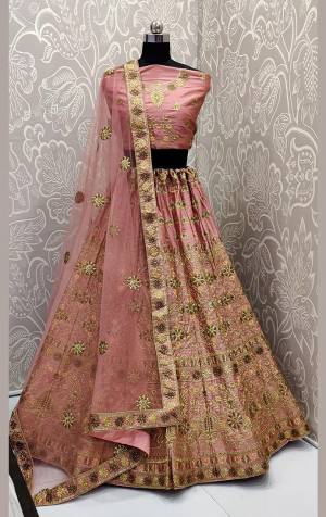 Get Ready For The Upcoming Wedding Season With This Very Pretty Heavy Embroidered Designer Lehenga Choli In Pink Color. This Beautiful Lehenga Choli Is Fabricated On Satin Silk Paired With Net Fabricated Dupatta. Buy Now. 